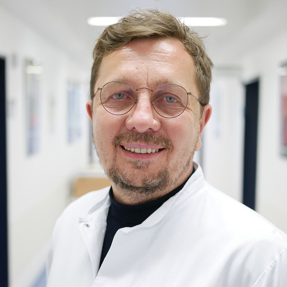 Dr. Andrei Tropine